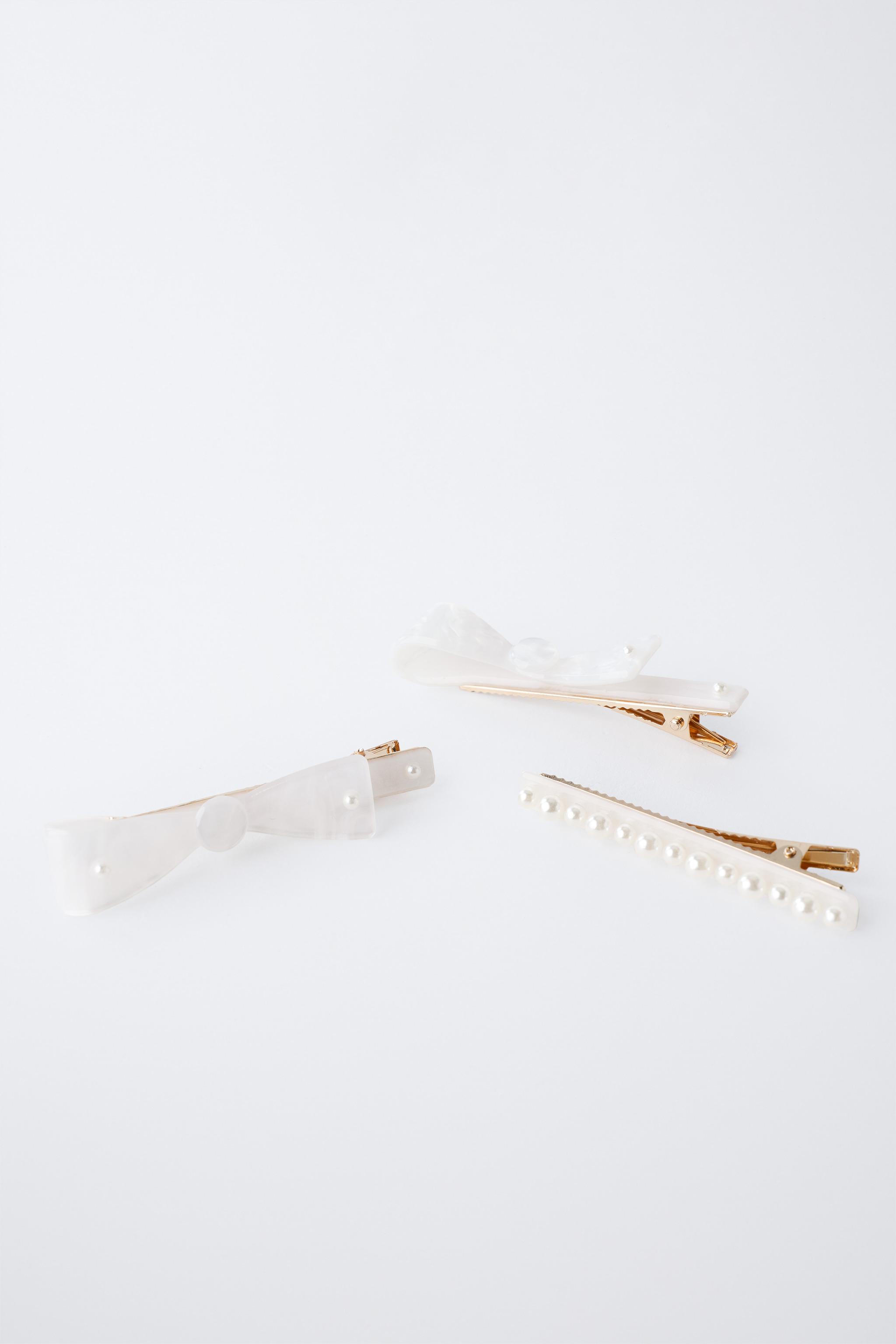 PACK OF THREE MOTHER-OF-PEARL HAIR CLIPS WITH BOWS AND PEARLS